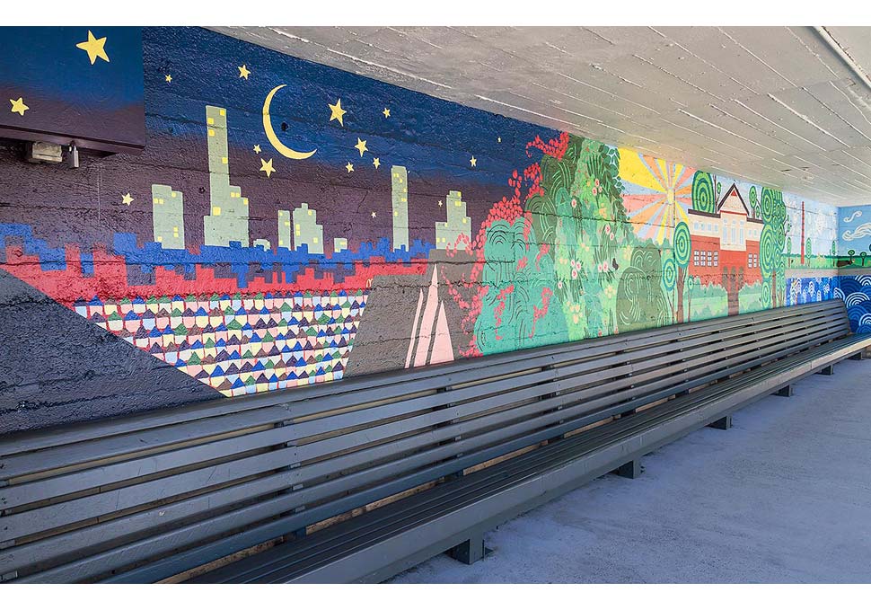 Art, mural painted at bus stop featuring brightly coloured landscape of Newmarket, by Maya Walker
