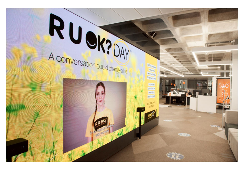 Communication, R U OK? Day messages displayed on floor to ceiling digital wall
