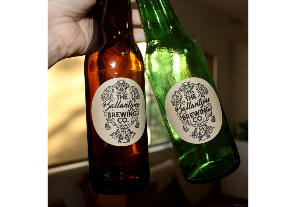 Graphic design, bottles with Ballantyne Brewing Co. stickers by Maya Walker